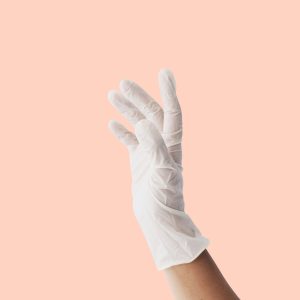 Hand Wearing White Latex Glove Prevent Coronavirus Contamination